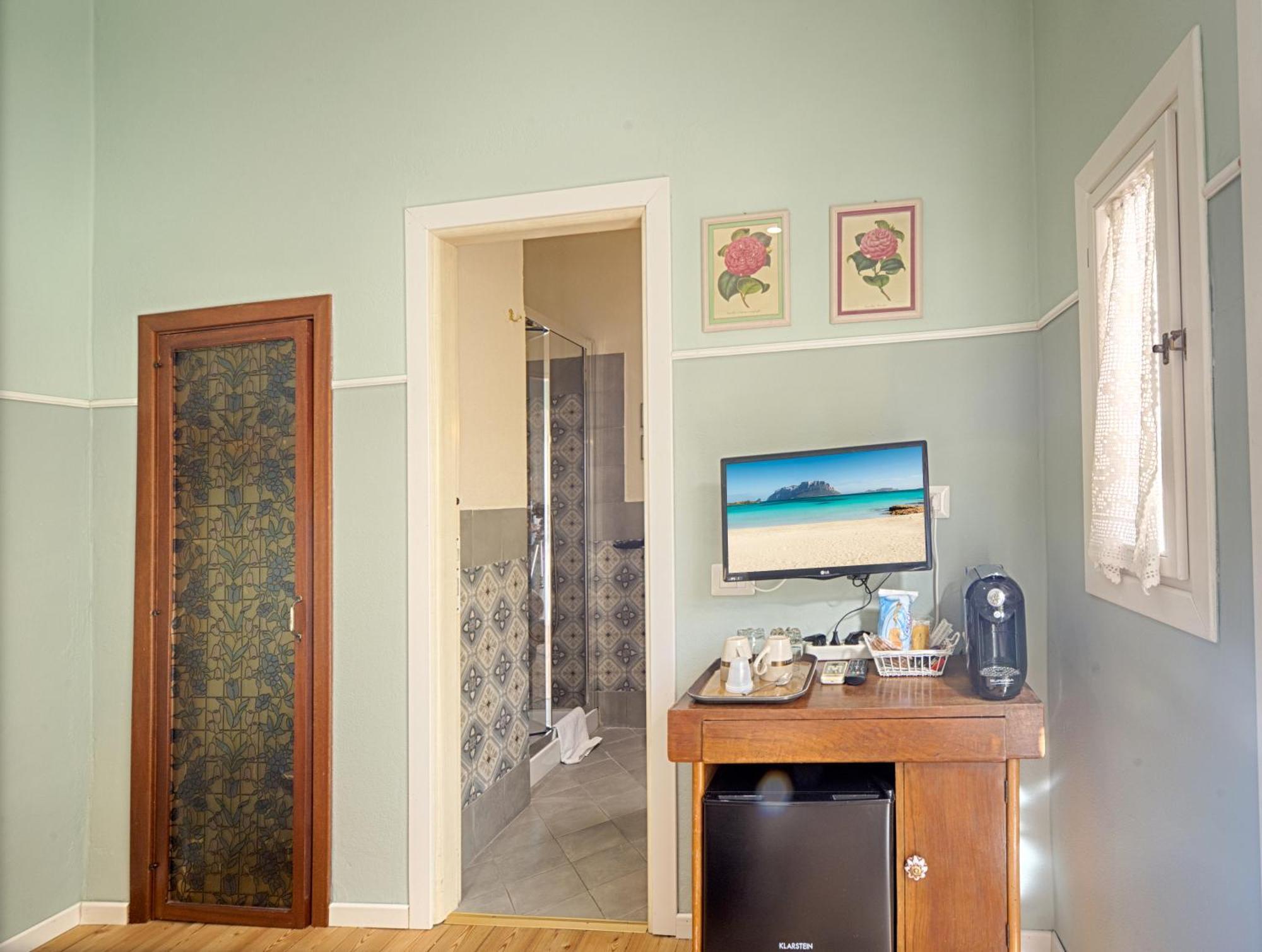 Casa Satta 1925 Hotel Olbia Bilik gambar